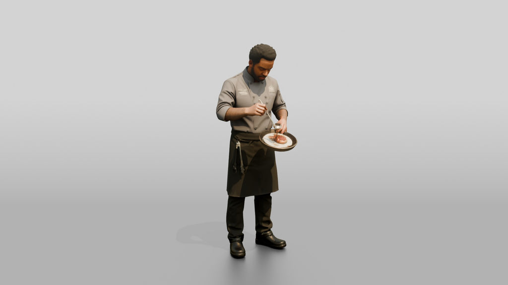Sous Chef Saucing a Duck Breast