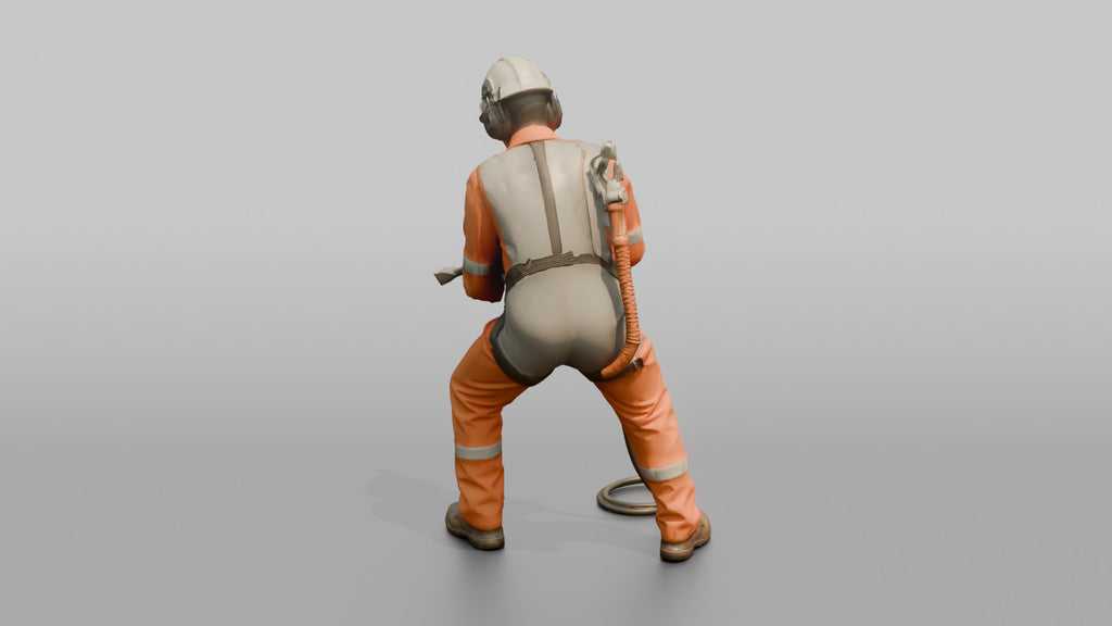 Ordinary Seaman Scraping Rust Off a Hull Plate