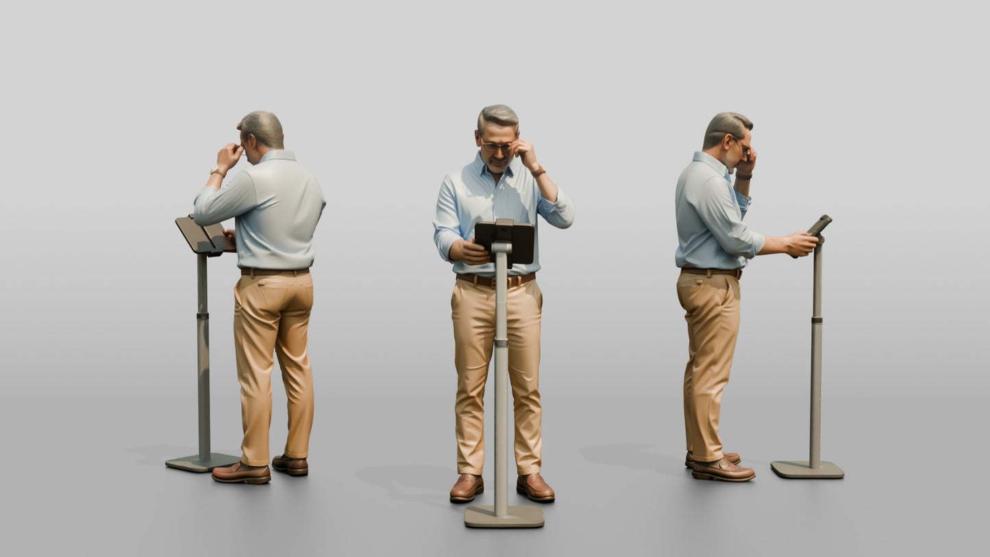 Businessman at a Standing Desk with a Tablet