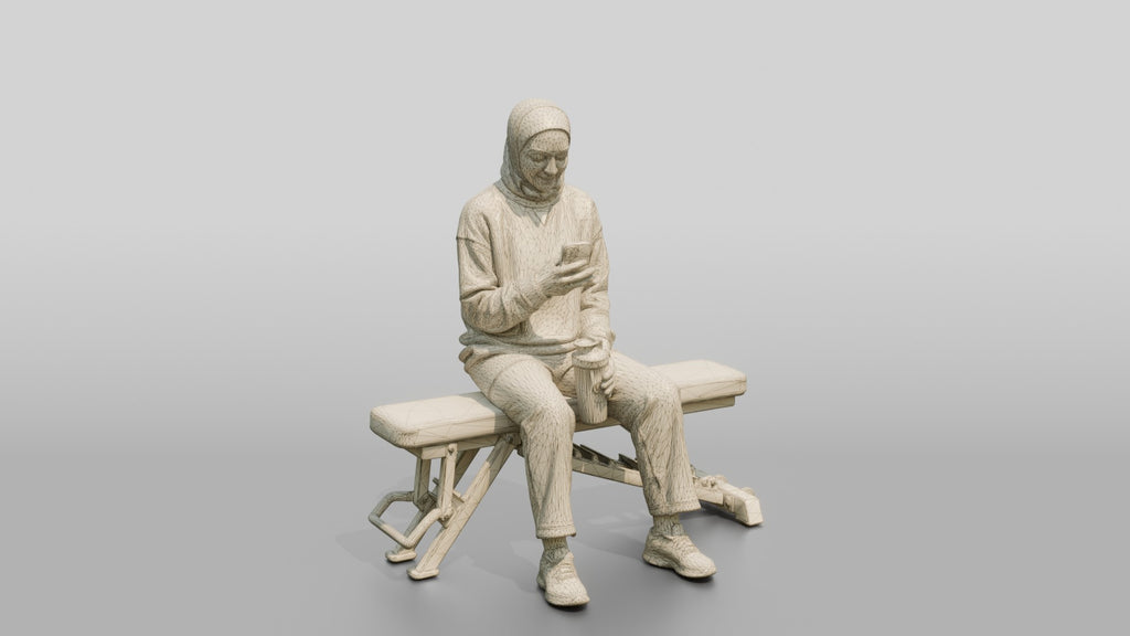 Woman in Sports Hijab Sitting