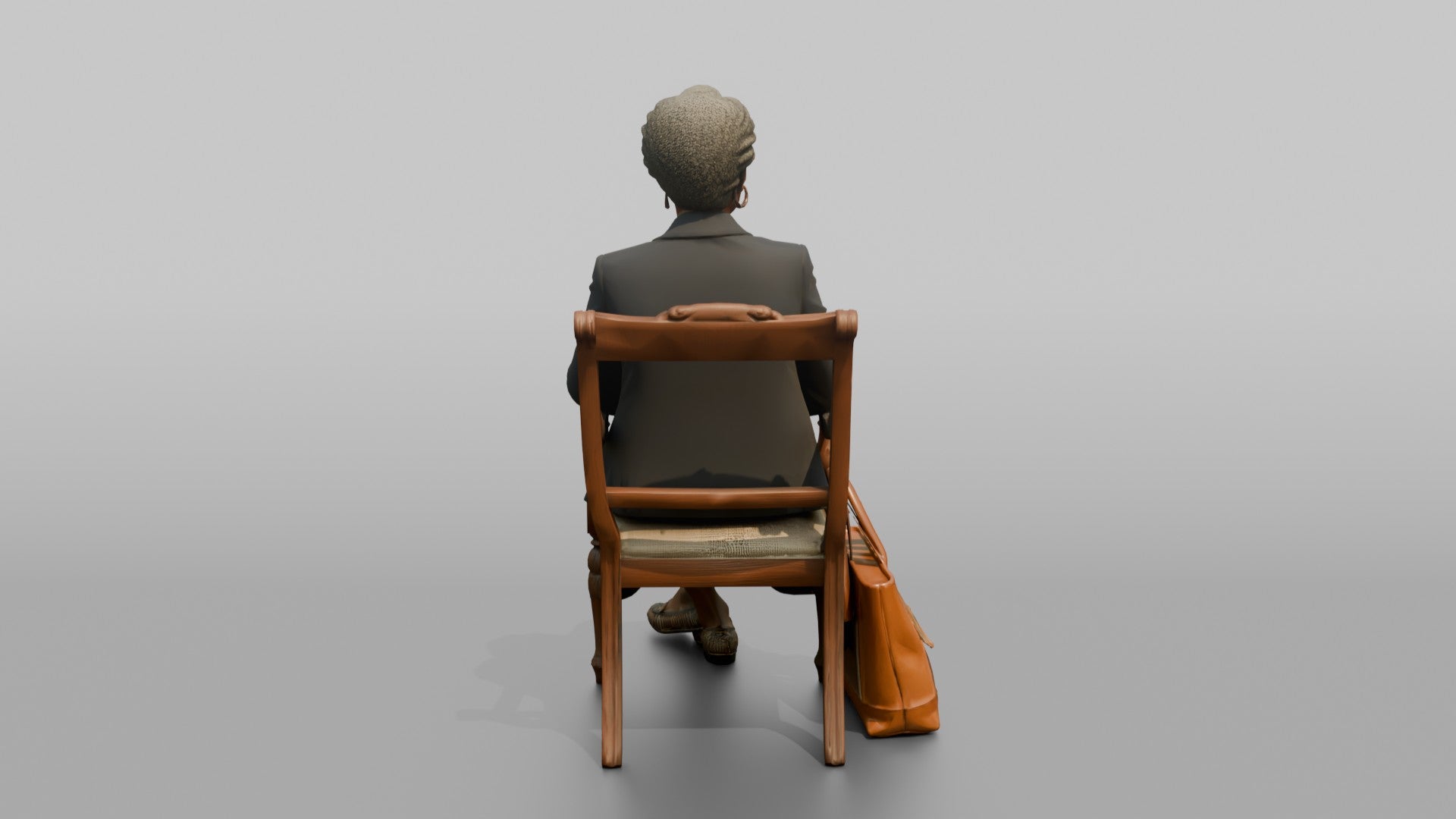 African Senior Woman Seated with Leather Tote Bag