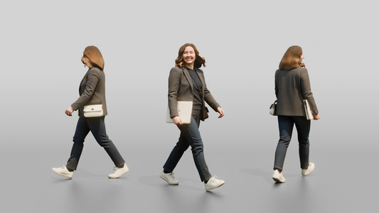 Businesswoman Walking with a Laptop