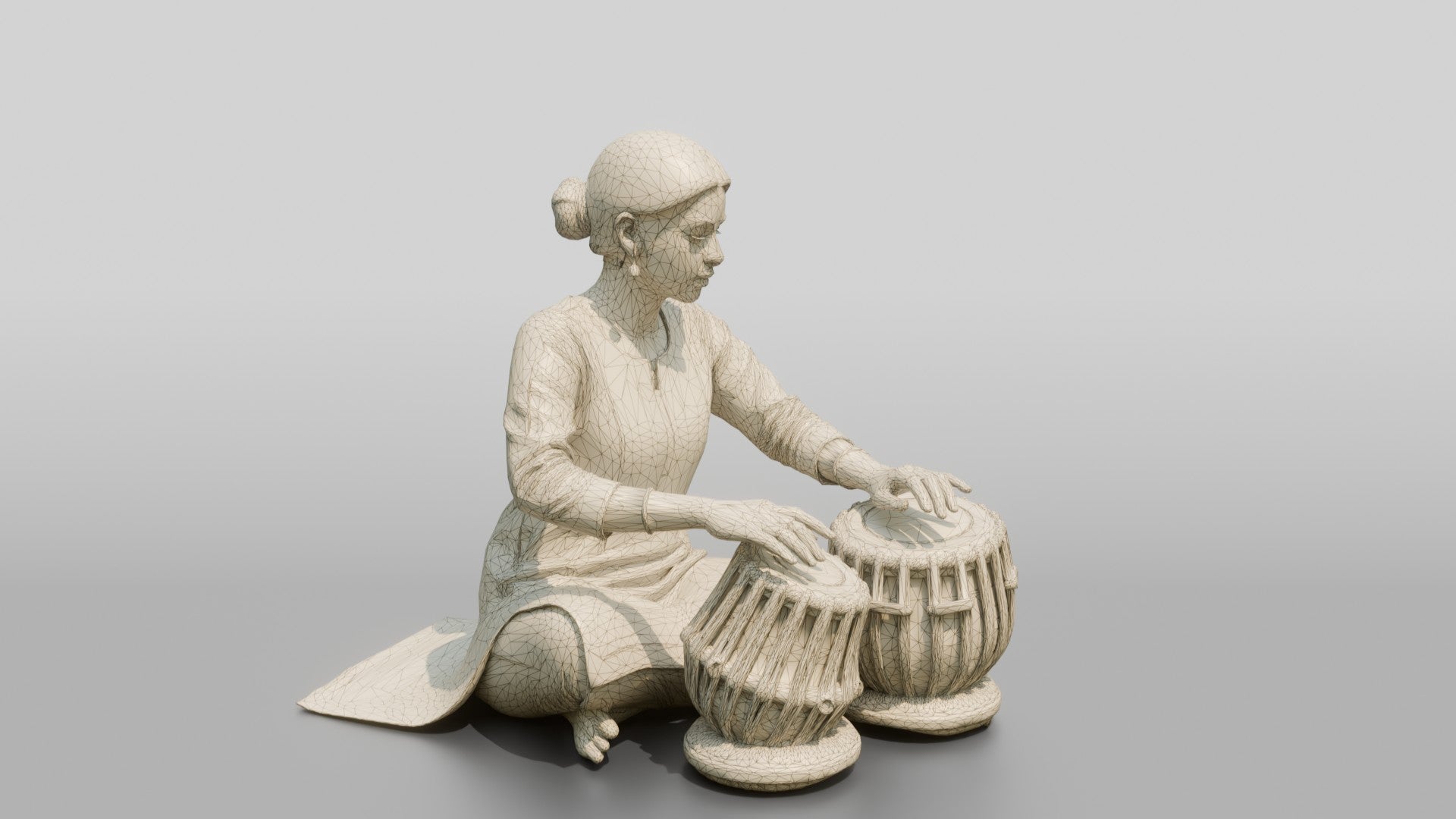 Tabla Player Seated with Twin Drums