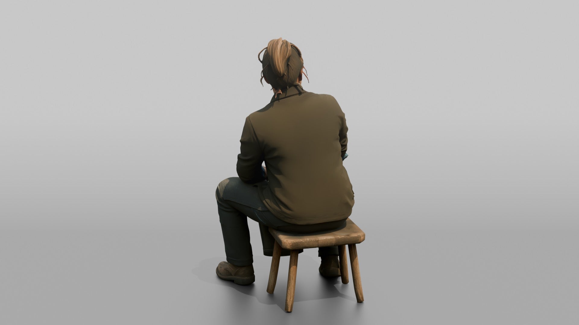 Farmer Sitting On Stool In Milking Position