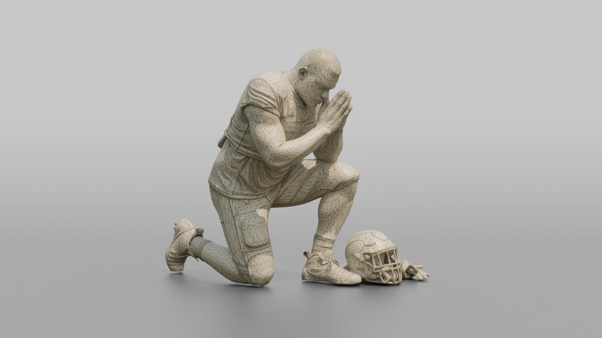 Player Kneeling in Prayer Before the Game