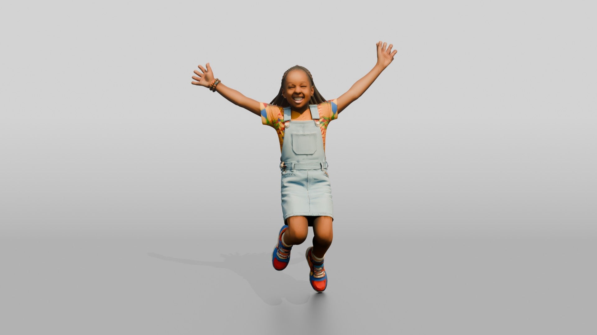 African Girl Jumping Excitedly in a Denim Overall Dress
