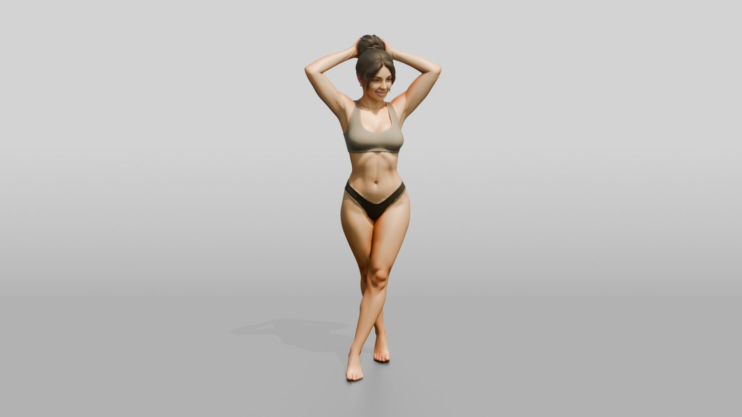 Woman in Black Two-Piece Swimsuit with Arms Raised