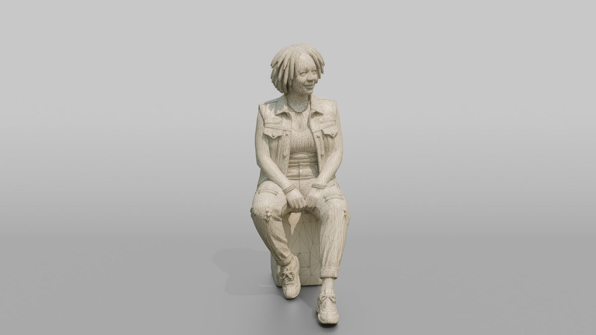 African Woman in Denim Vest Sitting on Concrete Block - wireframe topology preview