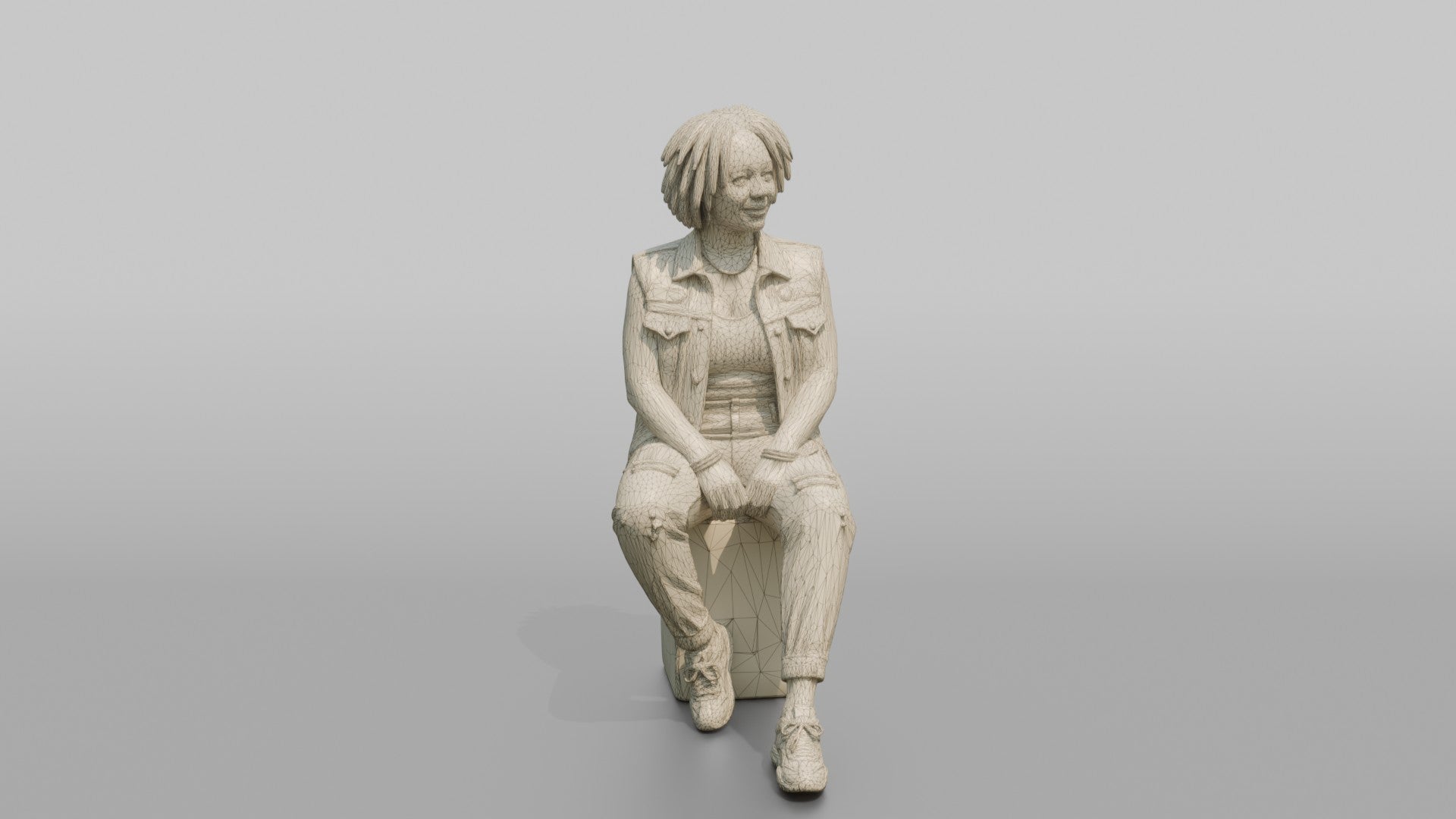 African Woman in Denim Vest Sitting on Concrete Block
