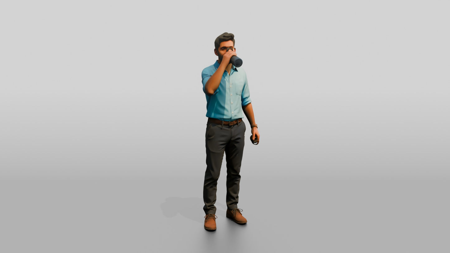 Man Sipping Coffee in a Blue Shirt