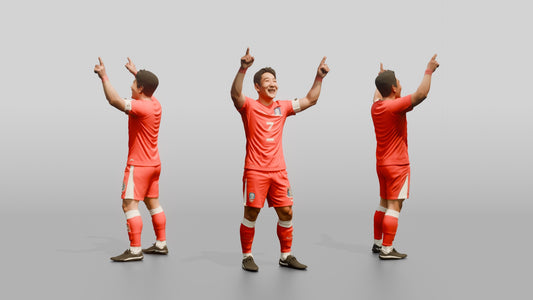 Soccer Player Pointing to the Sky