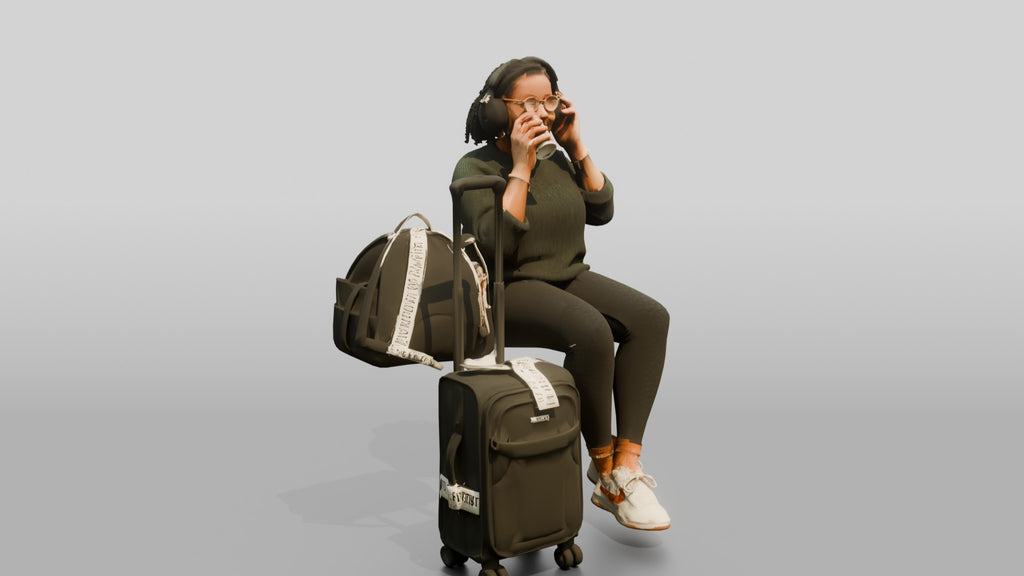 Plus-Size Black Woman Seated with Headphones Drinking Coffee