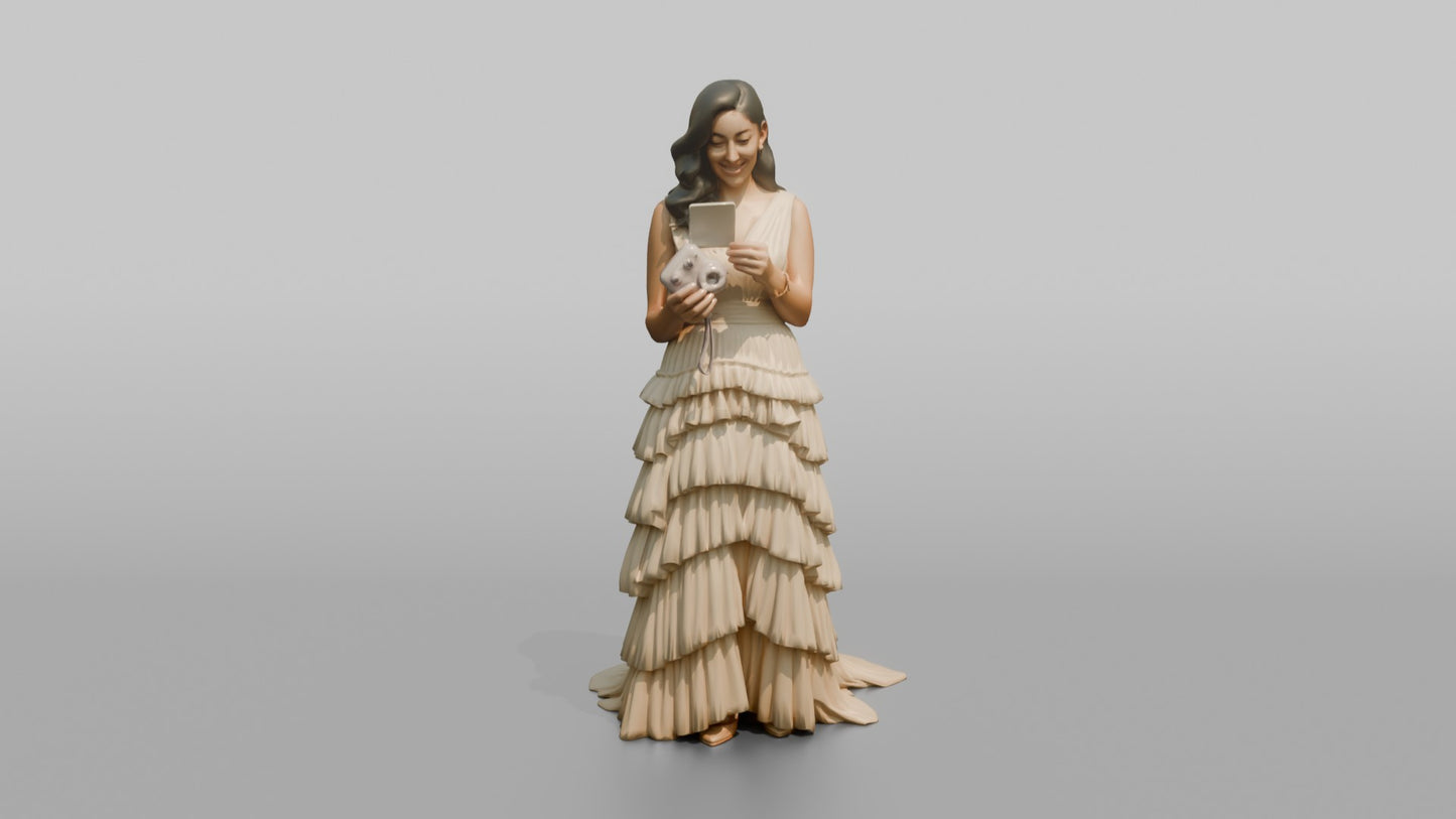 Wedding Guest Looking at a Polaroid Photo