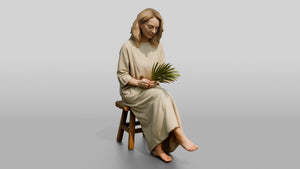 Woman Holding a Palm Leaf on a Chair - 3D character model, view 1