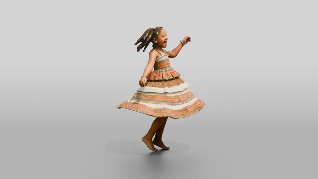Joyful African Girl Spinning in a Tiered Dress