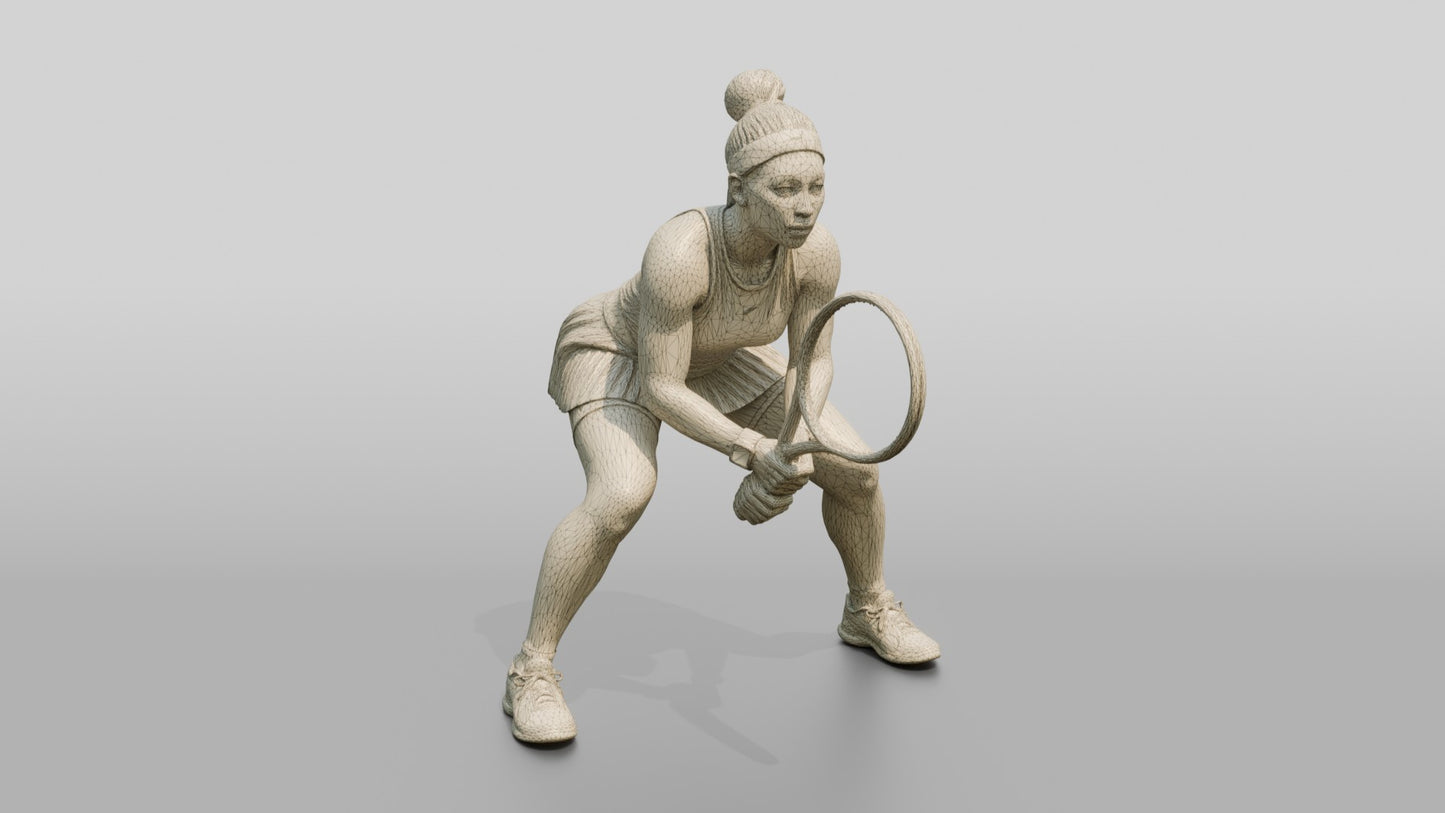 Female Tennis Player Crouched in a Ready Position