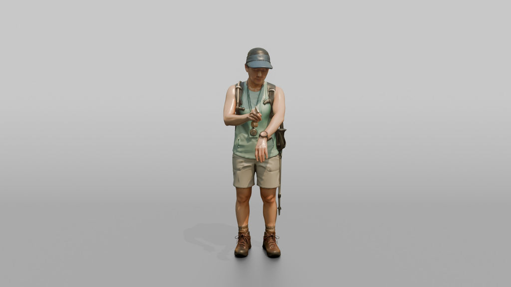 Hiker Applying Sunscreen to Her Arms