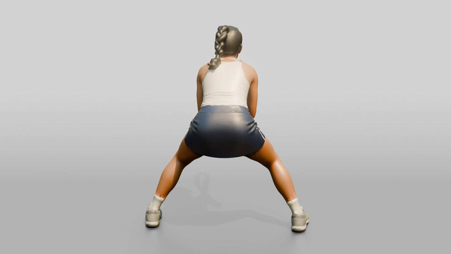 Female Tennis Player in a Low Baseline Ready Stance