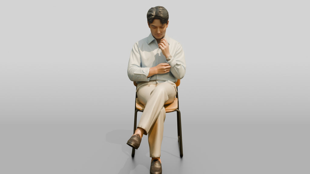 Businessman Sitting in Light Blue Shirt
