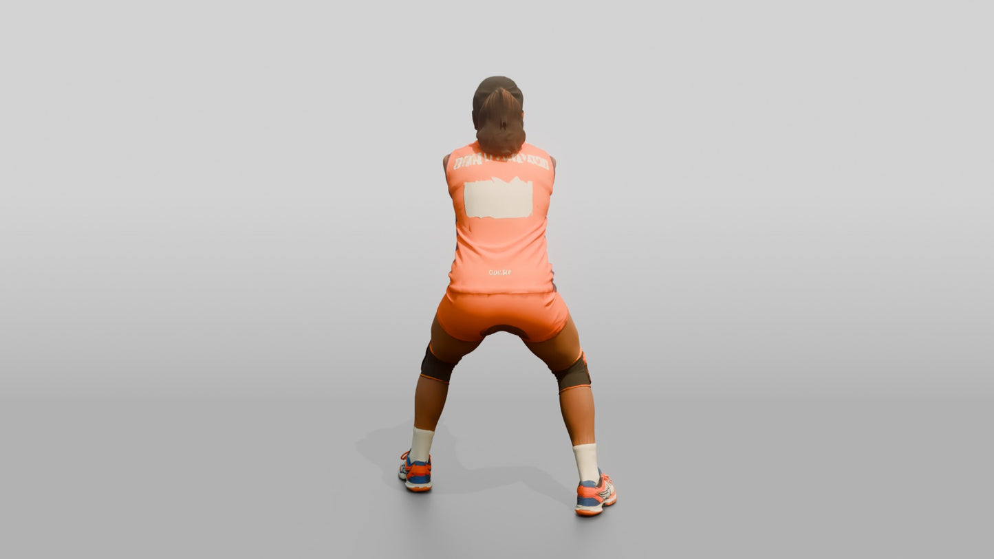 South Asian Female Volleyball Player in Orange Uniform