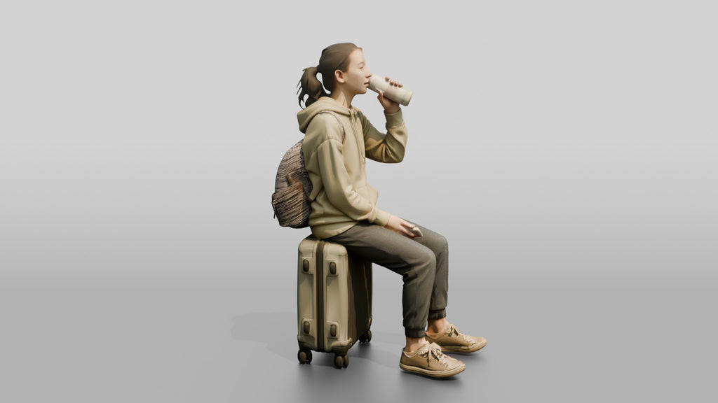 Young Woman Seated on Suitcase Drinking from Travel Cup