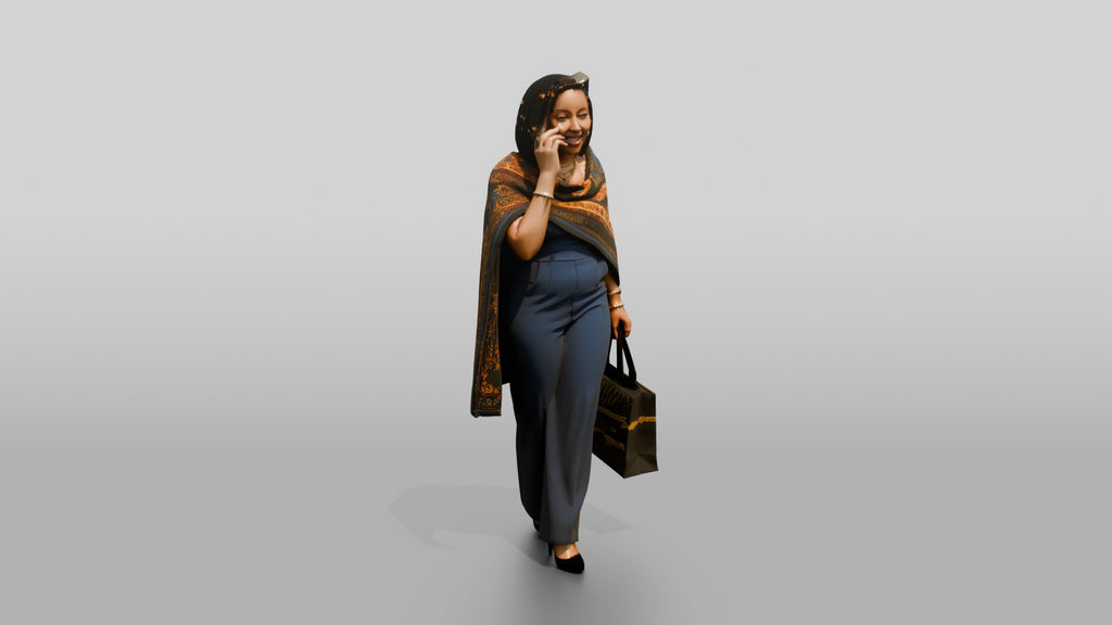 Woman in Printed Wrap Shawl Talking on the Phone
