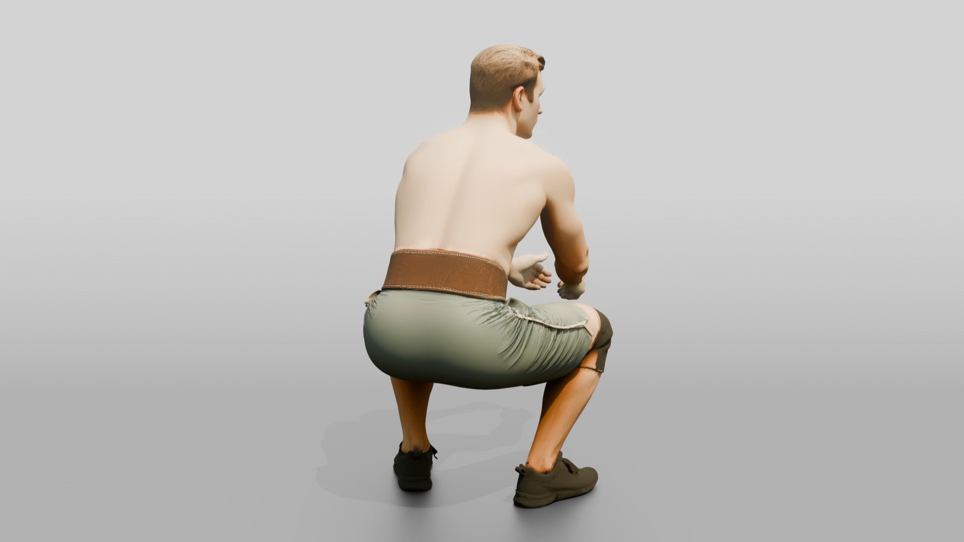 Man Squatting with Chalk and Belt