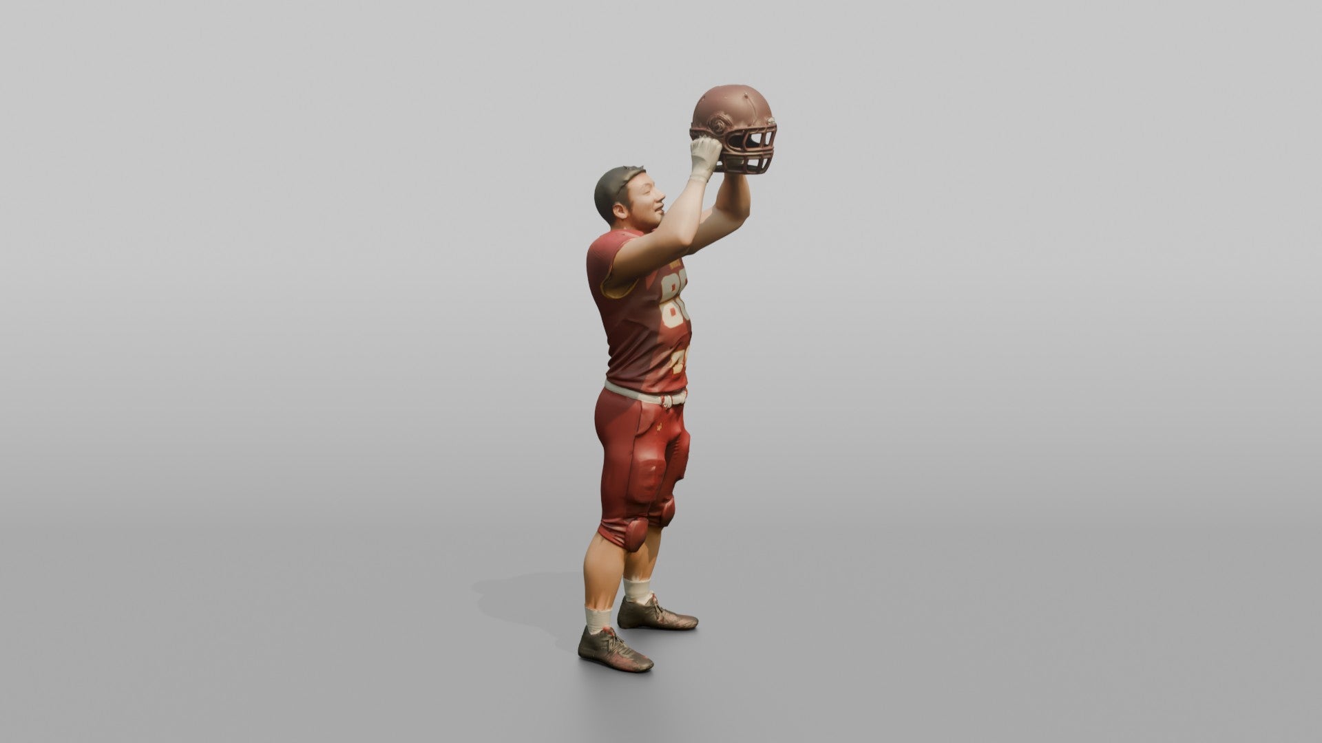 Player Raising His Helmet Triumphantly