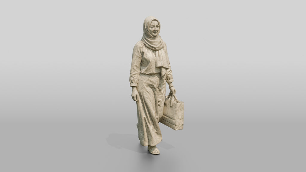 Slender Young Syrian Woman in Hijab with a Shopping Bag