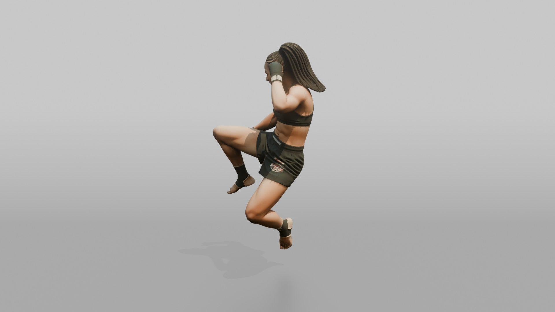 Fighter Jumping Knee Toward the Camera