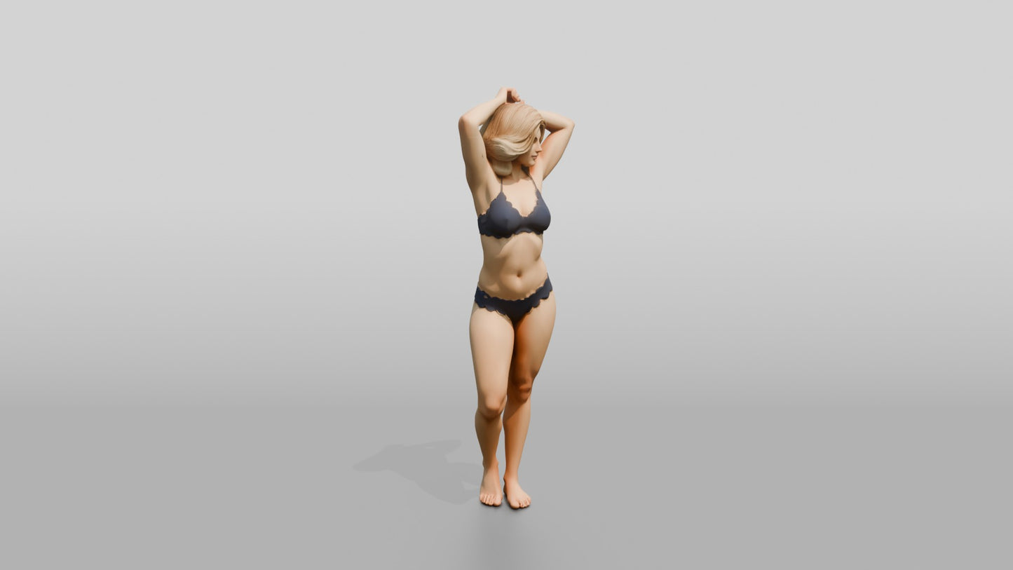Blonde Woman in Navy Two-Piece Swimsuit Arms Raised
