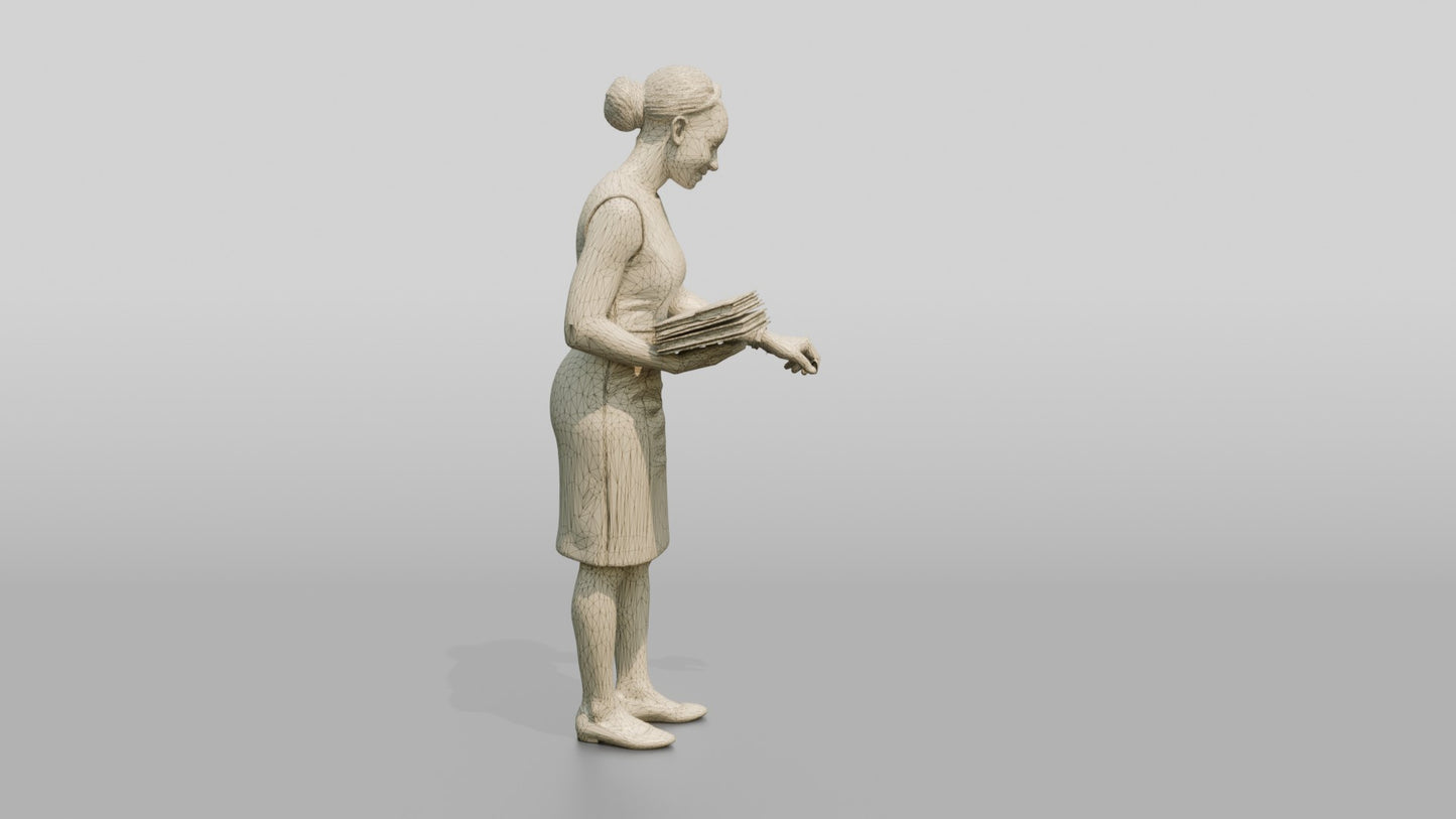 Woman Filing Documents in a Cabinet