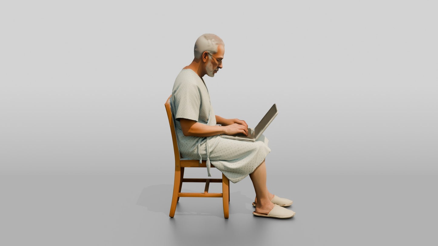 Elderly Man Patient Using a Laptop