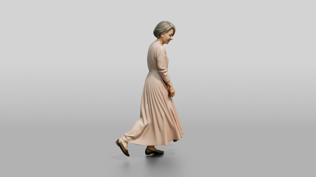 Elegant Woman in Flowing Pink Dress