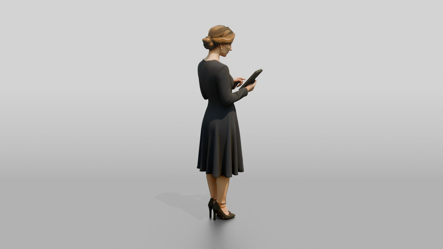 Woman Holding a Tablet in a Navy Dress