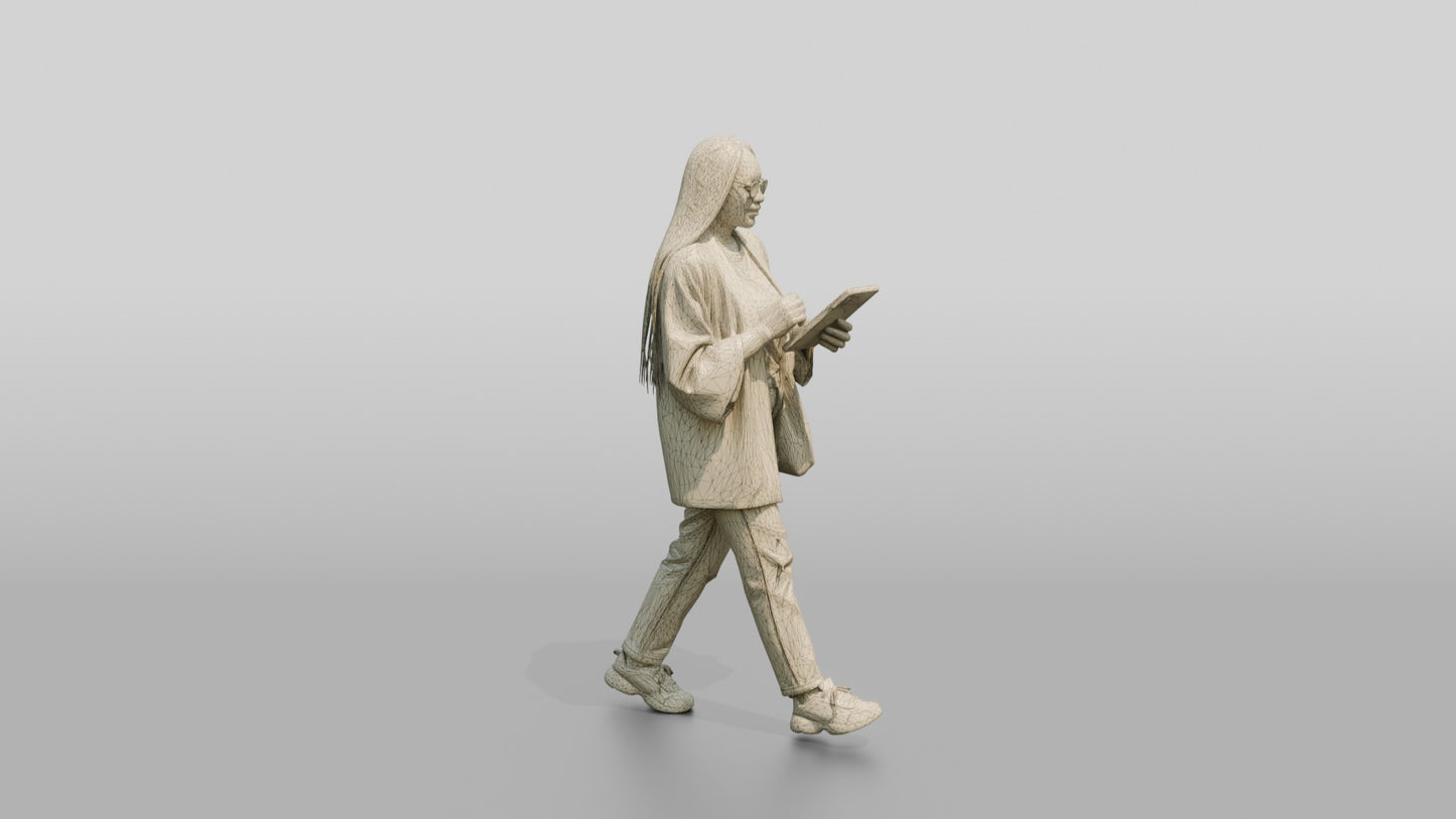 Businesswoman Walking with a Tablet