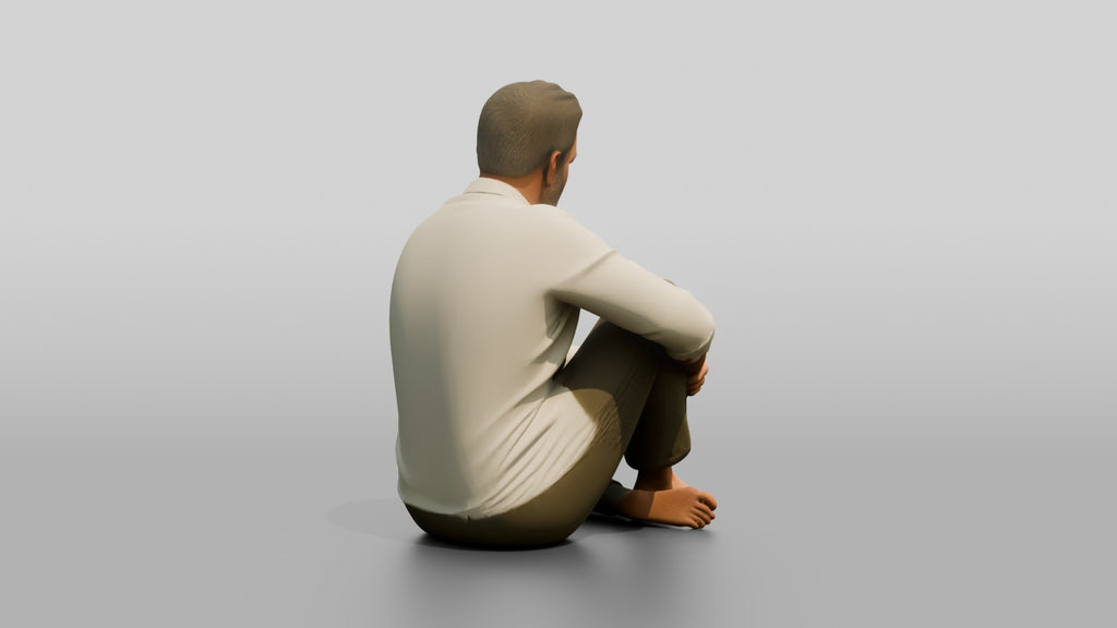 Man Seated Resting on His Knee
