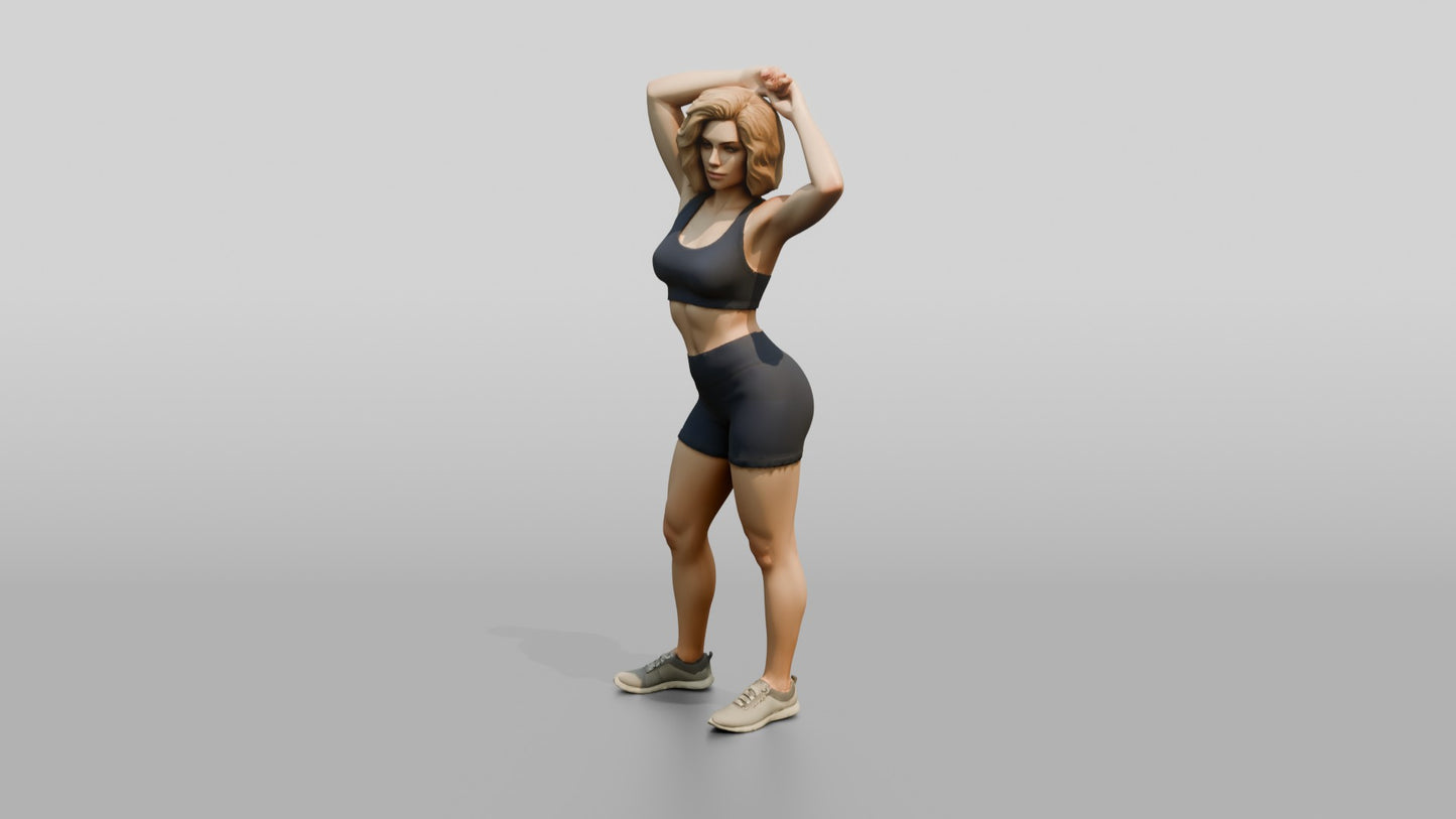 Blonde Woman in Charcoal Activewear Adjusting Her Hair