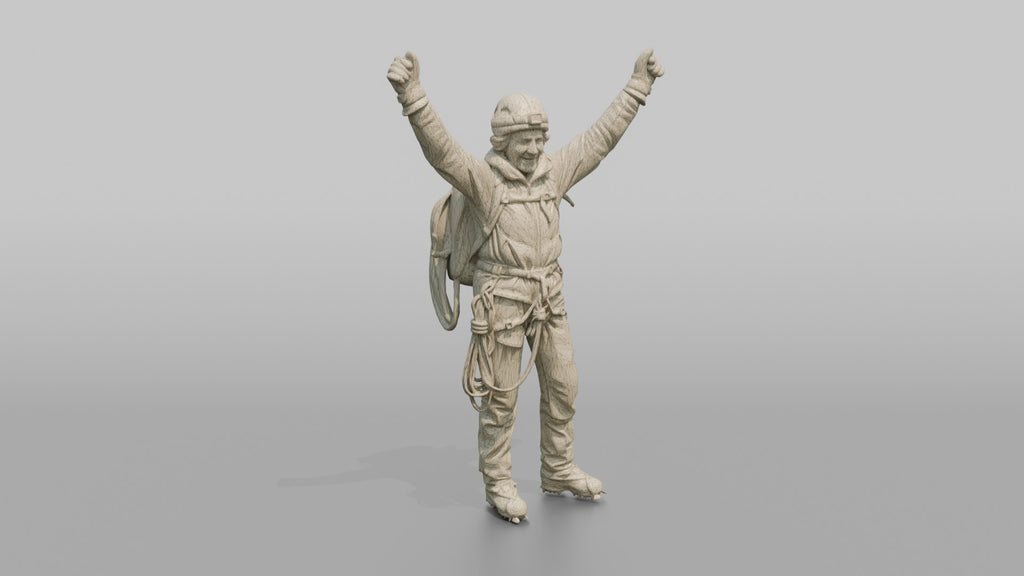 Mountaineer Raising Her Arms in Victory