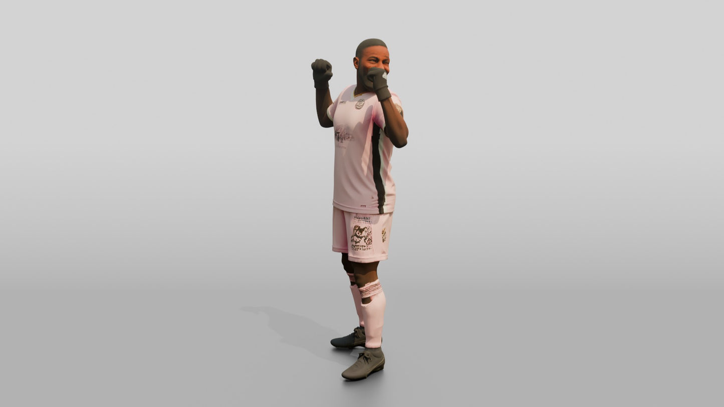 Soccer Player Pointing to Jersey Name