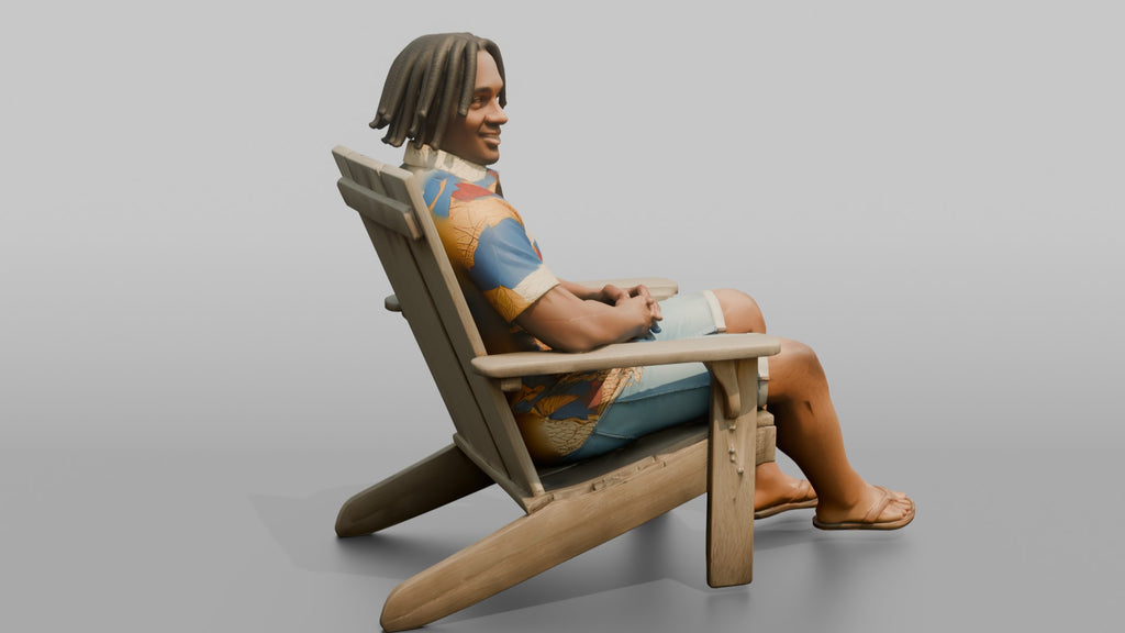 African Man with Dreadlocks Sitting in Lounge Chair