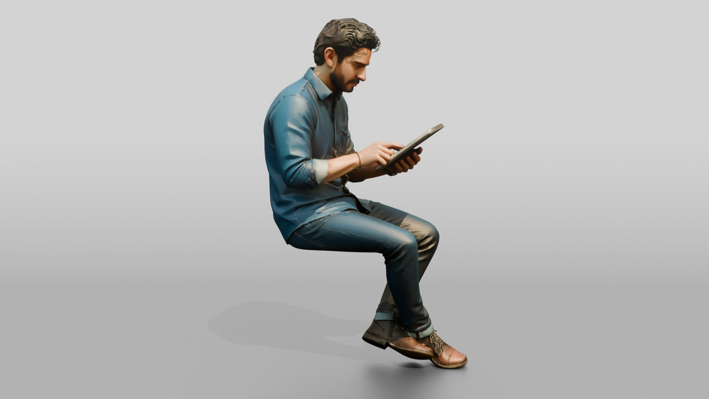 Man Using a Tablet on a Stool