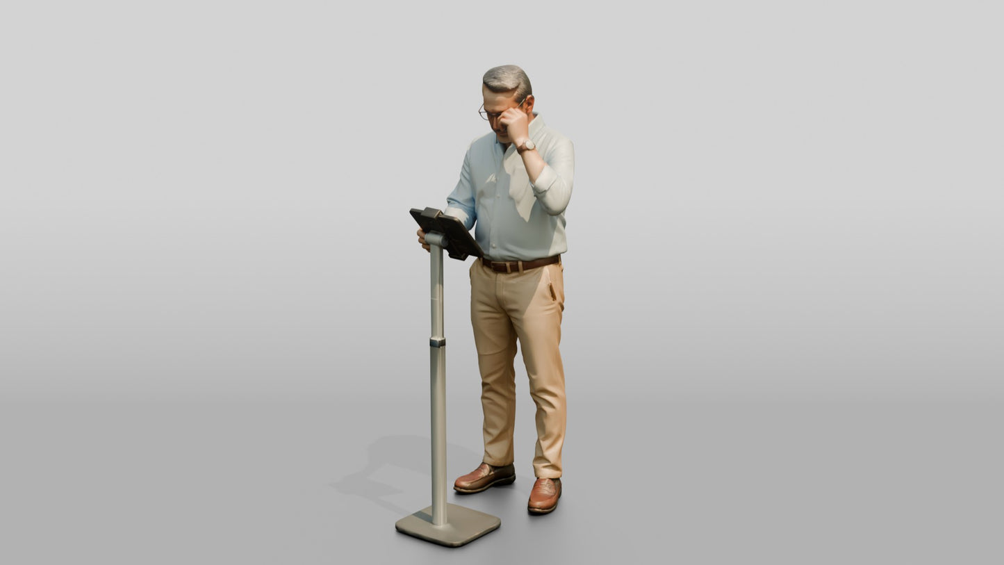 Businessman at a Standing Desk with a Tablet