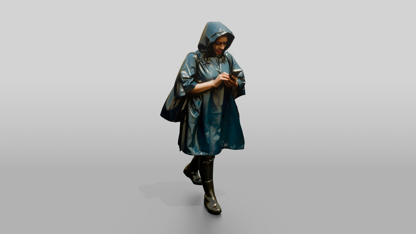Indian Woman in Blue Poncho Checking Phone