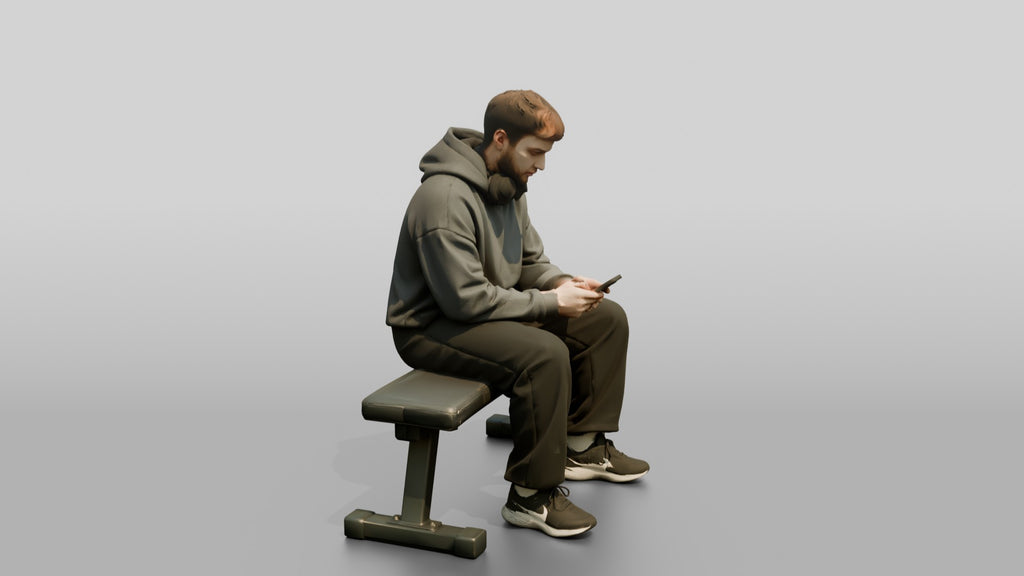 Man Sitting on Fitness Bench