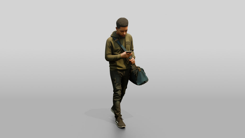 Young Black Man Walking and Looking at Phone with Duffel Bag