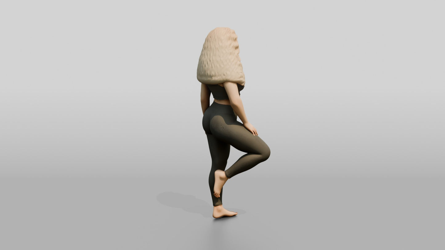 Blonde Woman in Charcoal Activewear in Tree Pose