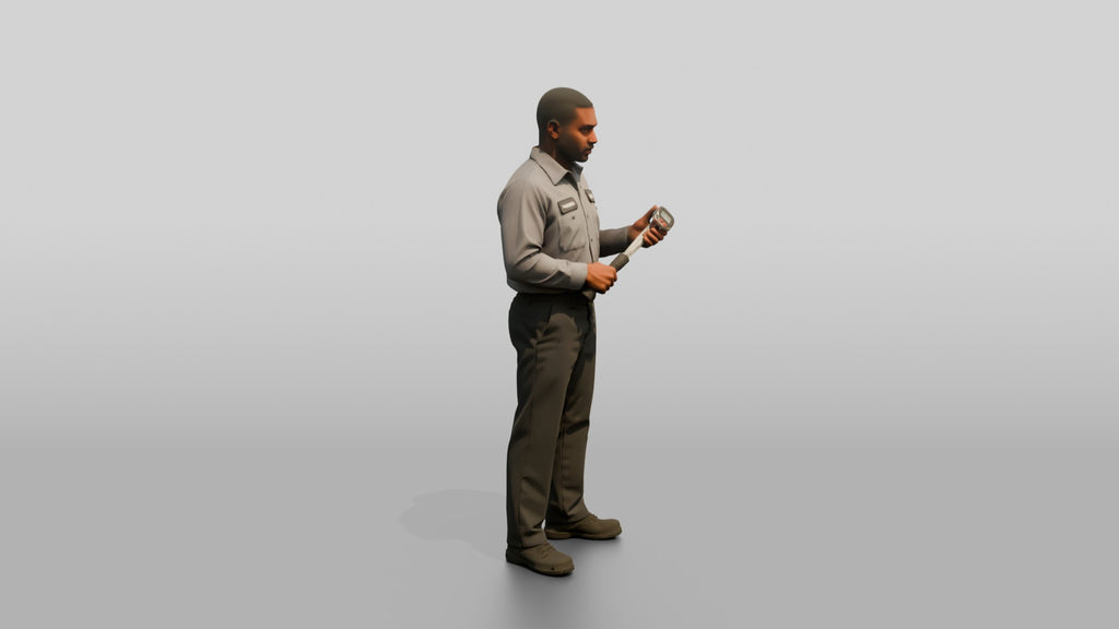 Mechanic Using a Torque Angle Gauge