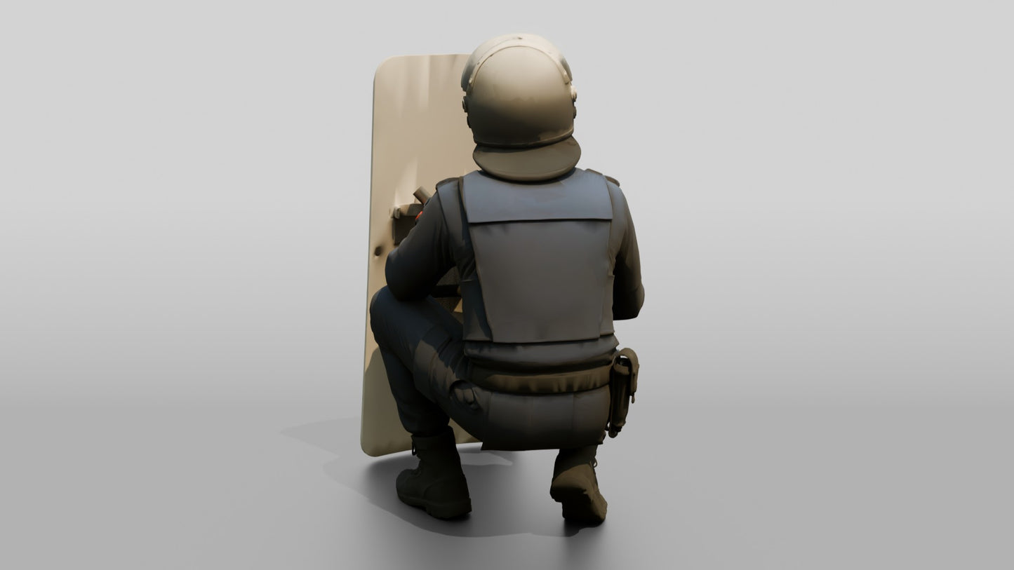 Riot Police Officer Crouching Behind Shield