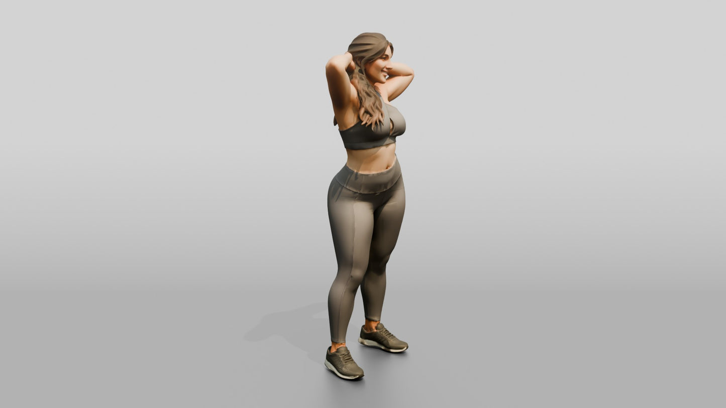 Curvy Woman in Grey Activewear with Arms Raised